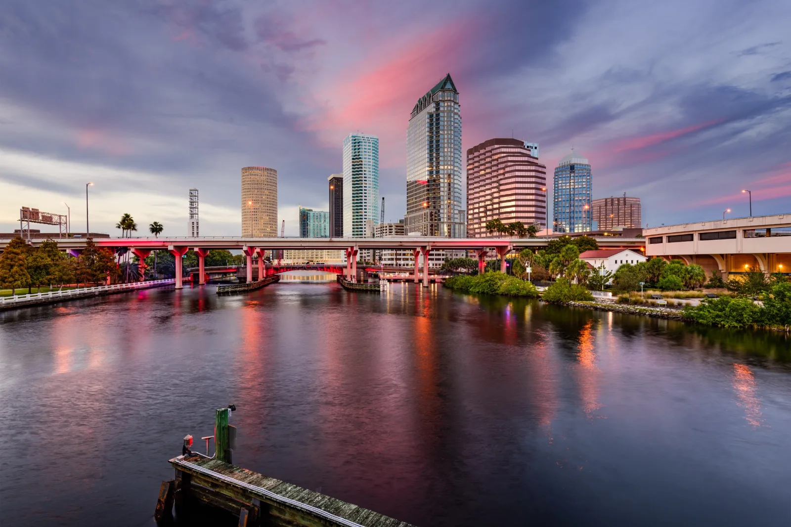 Tampa’s commercial skyline across the Hillsborough River at dusk